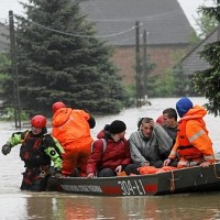 Firemen evacuate people from Cikowice village in southern Poland