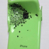 417_damaged-iphone-5c-and-shotgun
