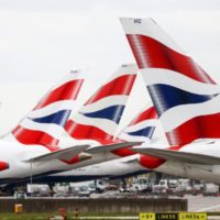 Flights Operated By British Airways Carry Passengers At Heathrow Airport